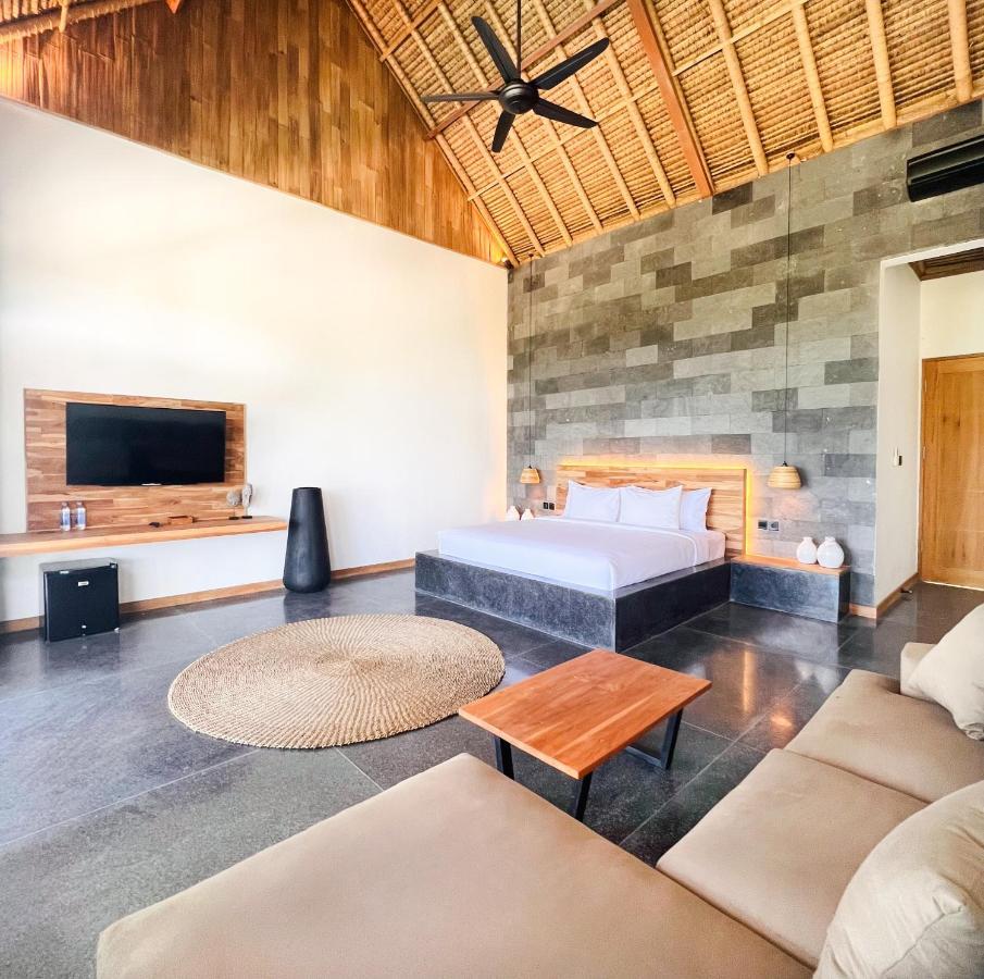 Neano Escape Hotel Manggis  Luaran gambar A bedroom at the resort